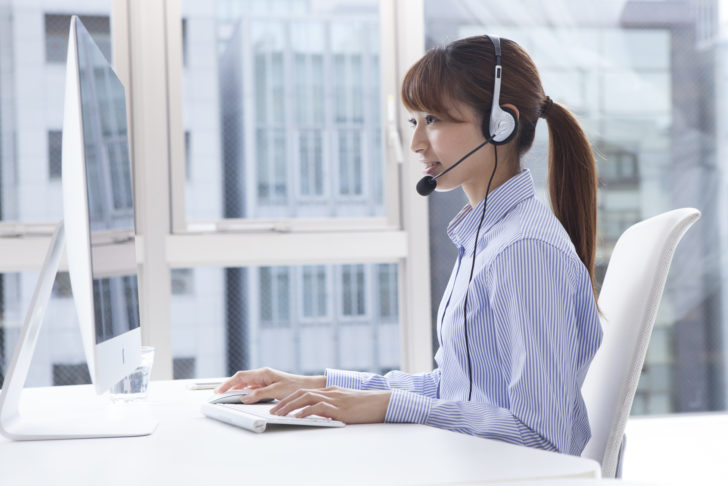 Young woman wearing a headset