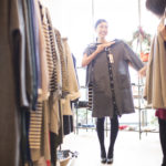 Women are choosing clothes with friends
