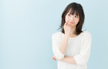 attractive asian woman on blue background