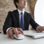 Businessmen are using the computer