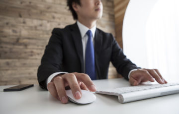 Businessmen are using the computer