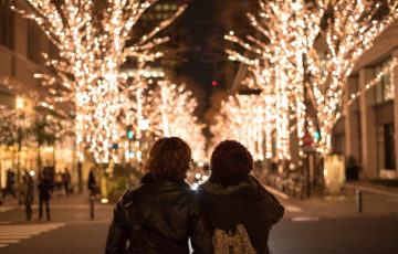 Asian couple with Christmas lights in Marunouchi, Tokyo